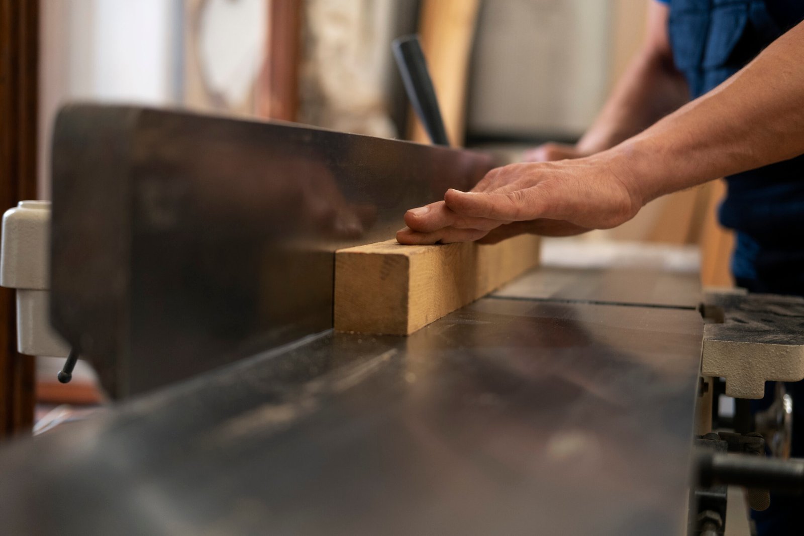 man-working-his-wood-shop-with-tools-equipment S.R. Brafford Construction Services