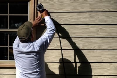 Skilled contractors performing siding installation in Sanford, North Carolina